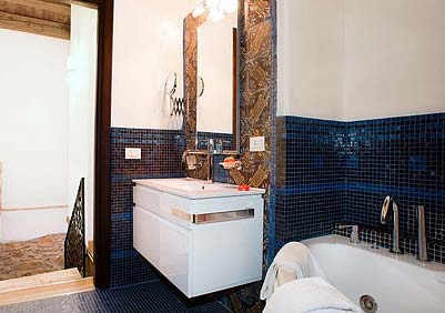 De badkamer van Appartamento Verdello